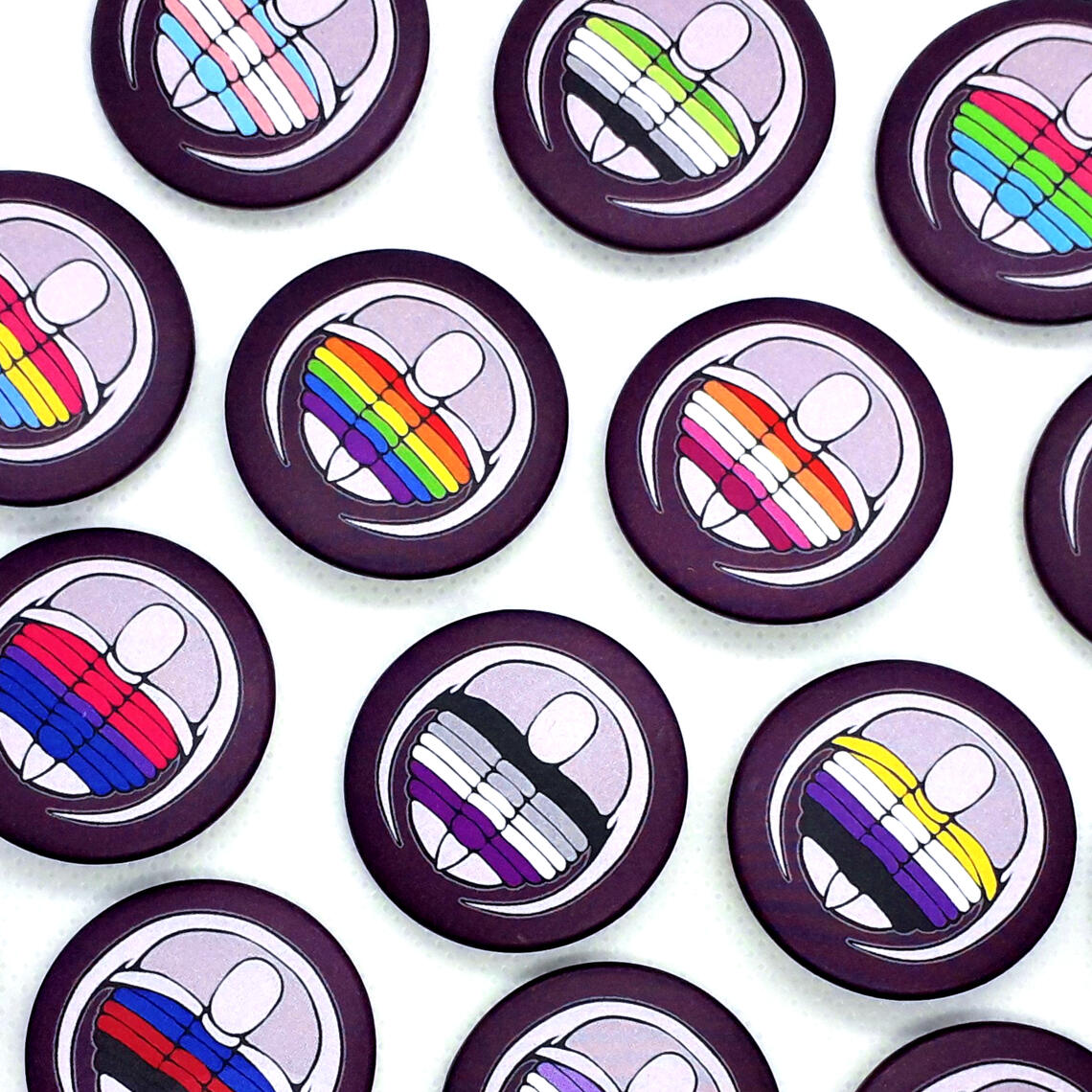 Trilobite badges featuring LGBT+ pride flags