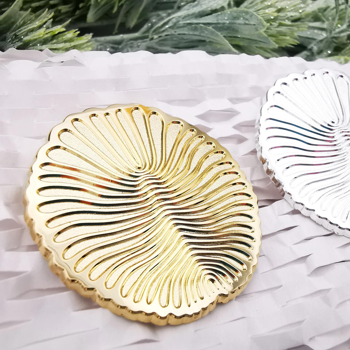 Dickinsonia gold and silver metal pins featuring LGBT+ Progress Pride Flag.cker featuring LGBT+ pride flags