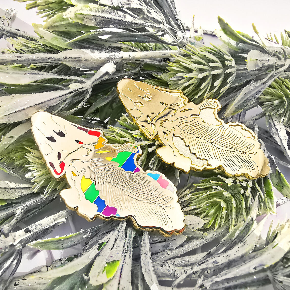 Tiktaalik enamel pins featuring LGBT+ Progress Pride Flag.